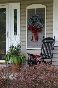 These stunning farmhouse style Christmas porches will inspire you to create beautiful farmhouse style decor of your own!